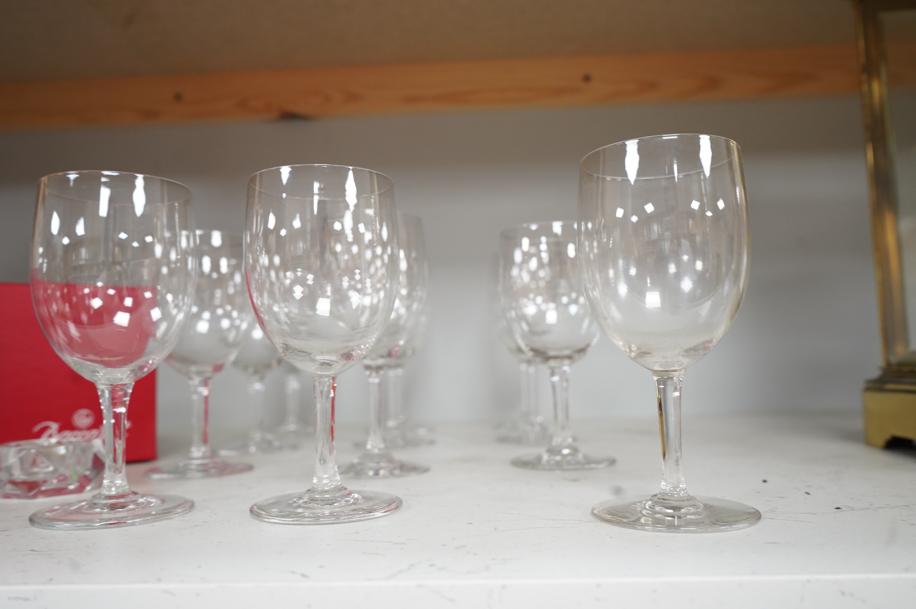 A set of twelve Baccarat crystal wine glasses and two tea light holders, with boxes, glasses 13cm high
